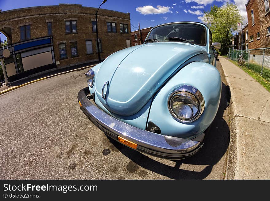 Vintage Blue Volkswagen Beetle thru a fisheye lens. Vintage Blue Volkswagen Beetle thru a fisheye lens