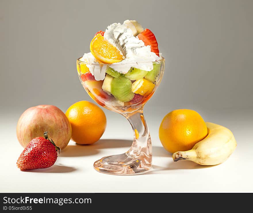 Glass dish full of various fruits, studio . Glass dish full of various fruits, studio .