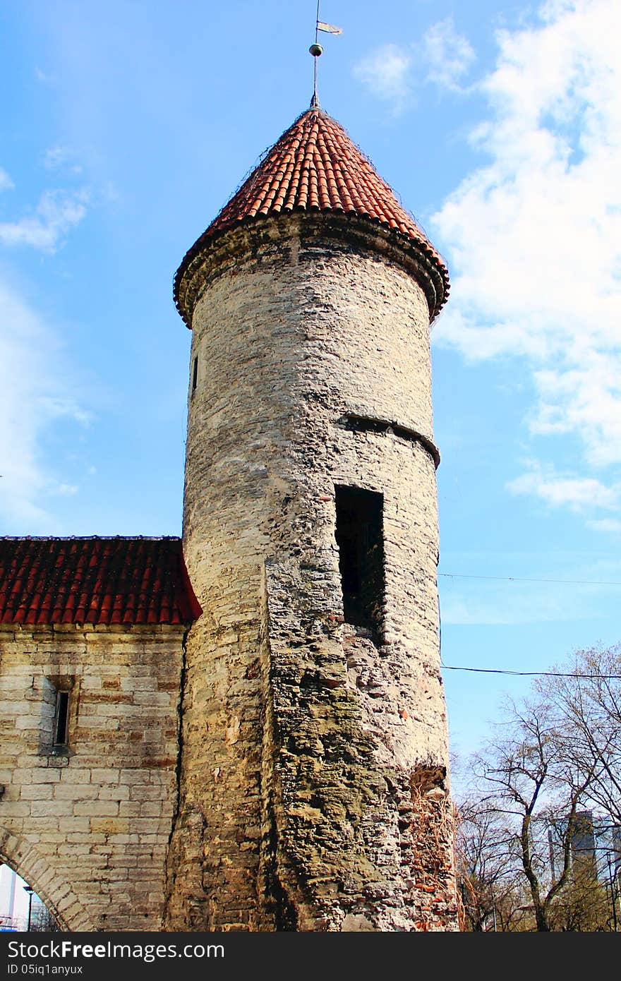 Tower and the house with red roof top view of the city. Tower and the house with red roof top view of the city