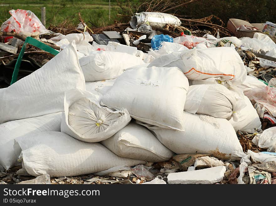 Pile of industrial garbage bags at rural