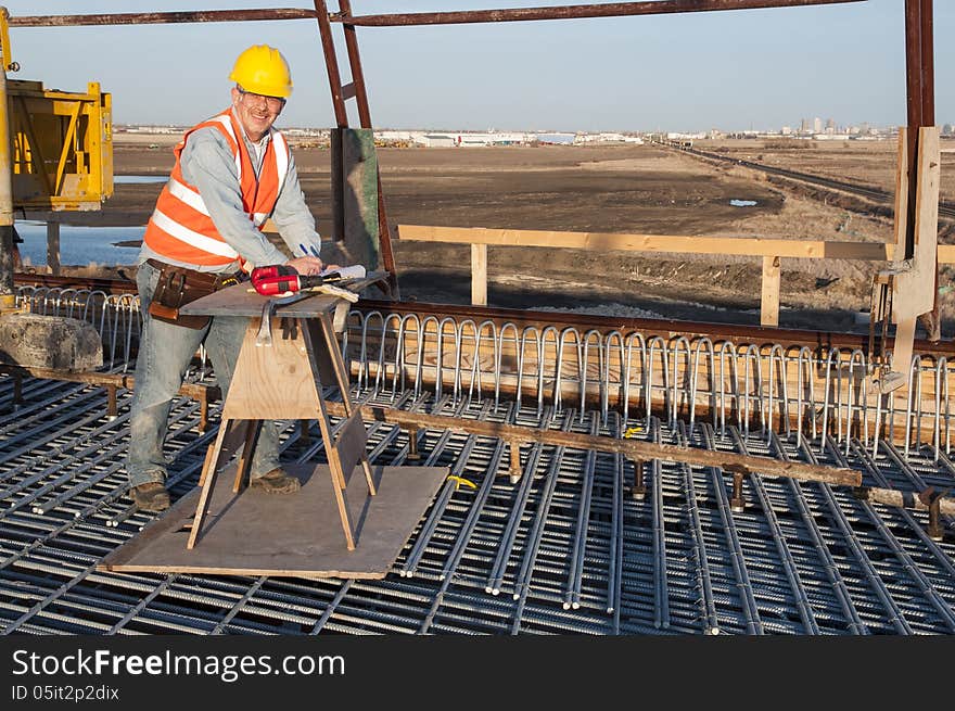 Worker at bridge construction site. Worker at bridge construction site