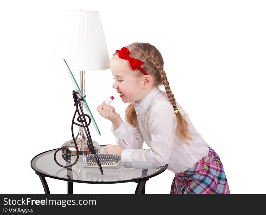 Fashion collection: Adorable little girl with lipstick isolated on white background