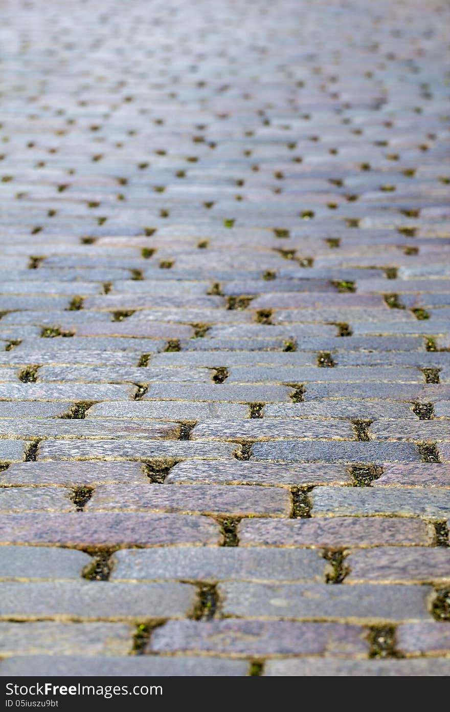 Cobble-stone pavement of a street in berlin.