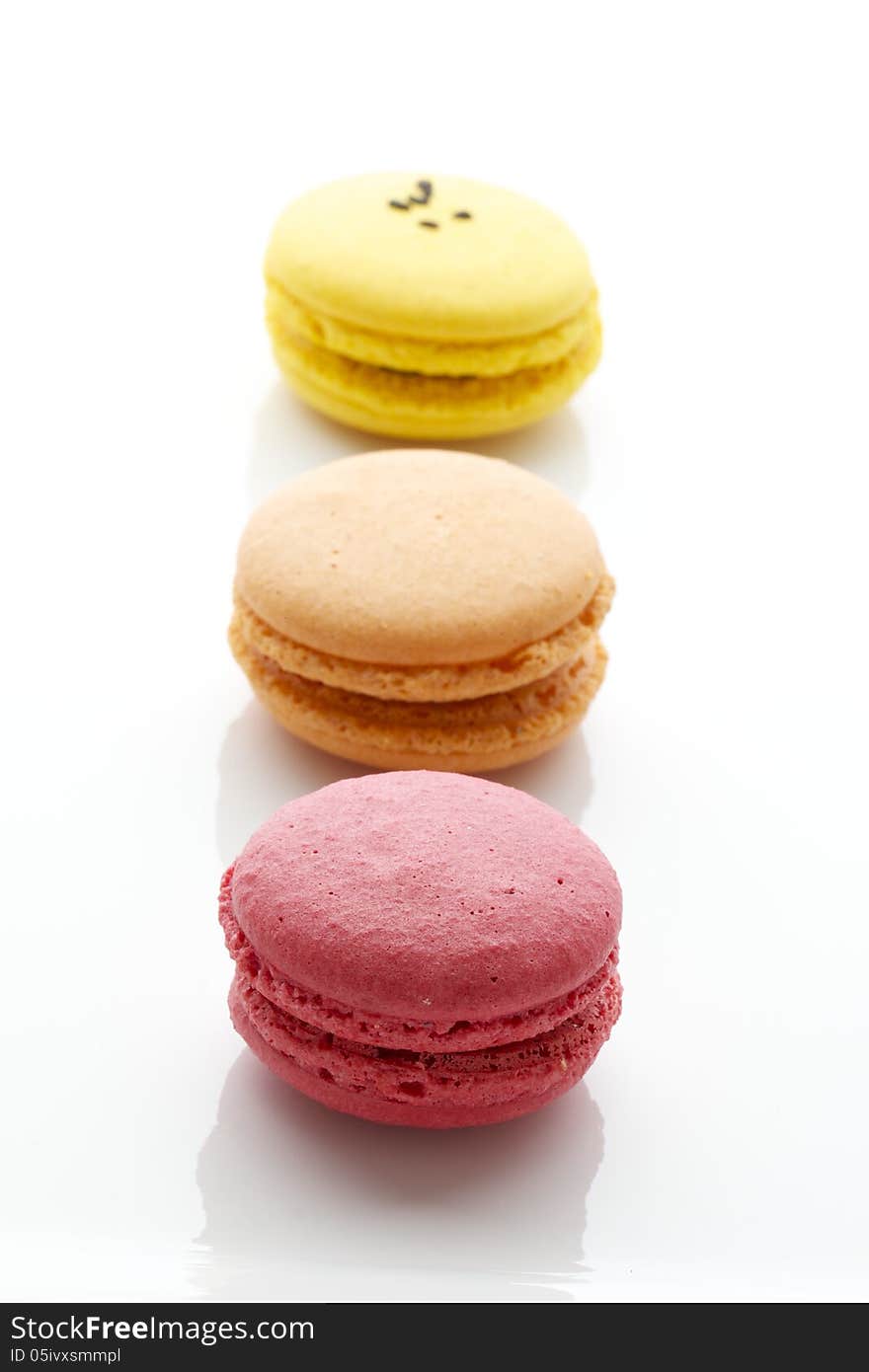 Assorted macarons on a white plate