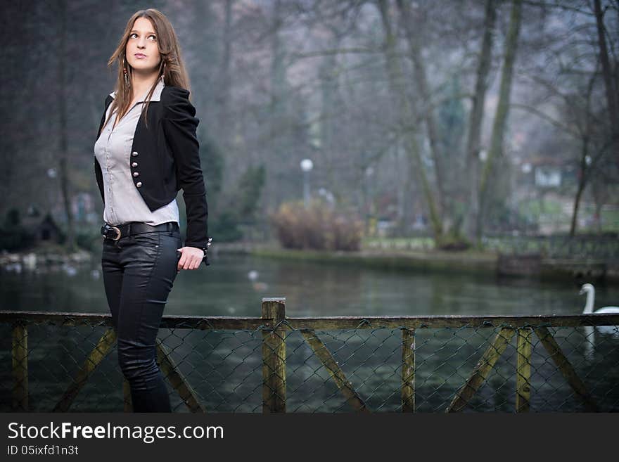 Young woman standing and posing. Young woman standing and posing