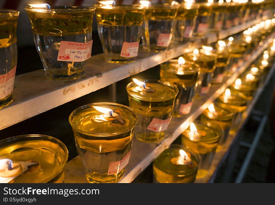 Oil lamp at Buddhist temple