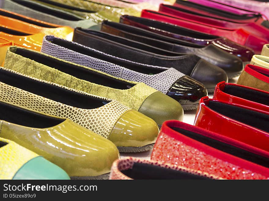 Variety of colorful, shiny shoes. Variety of colorful, shiny shoes