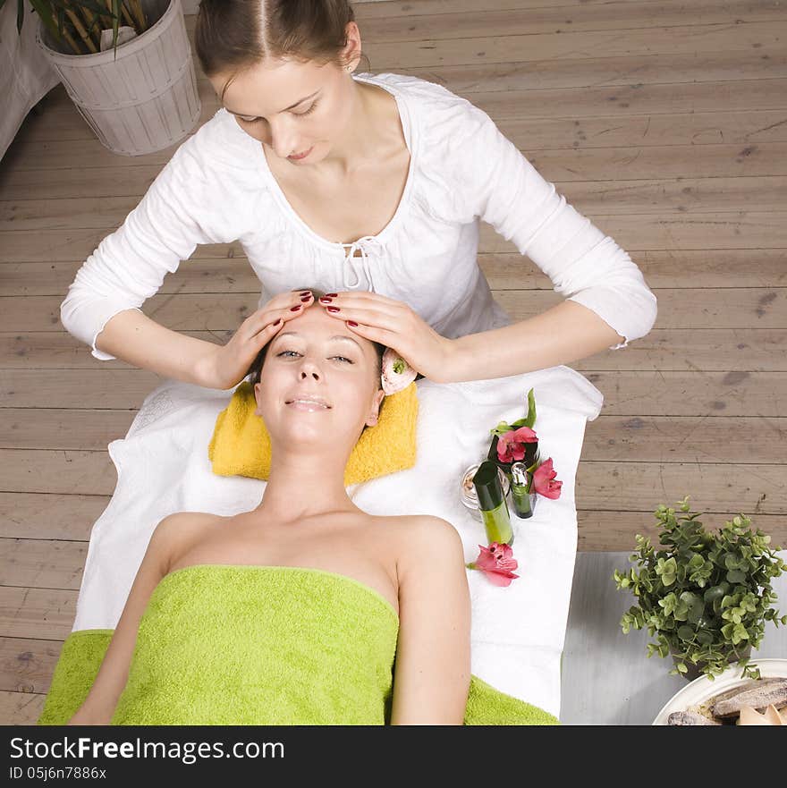 Stock photo attractive lady getting spa treatment in salon