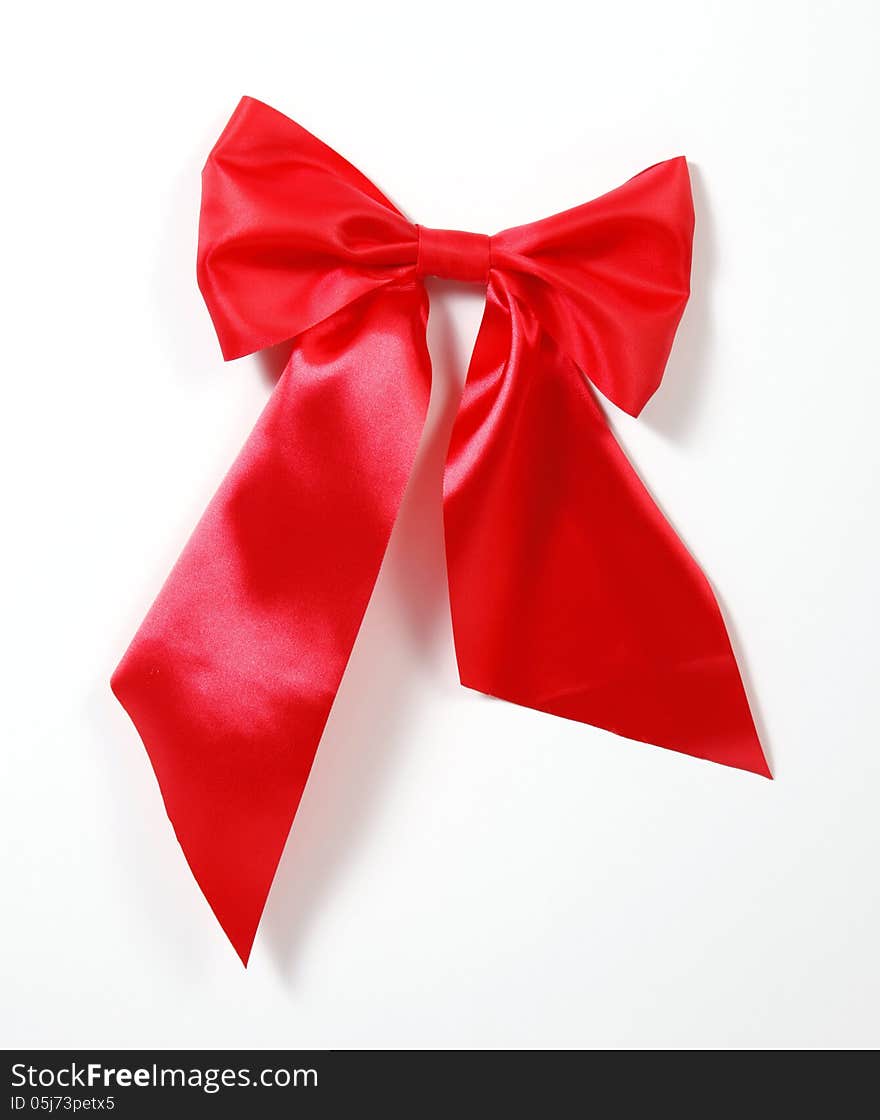 Red big bow on the white background