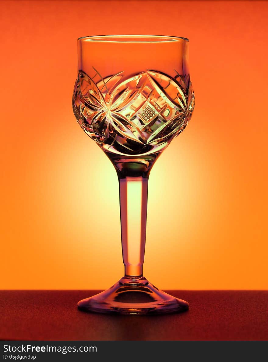 Small Liqueur Glass At The Orange Gradiend Background