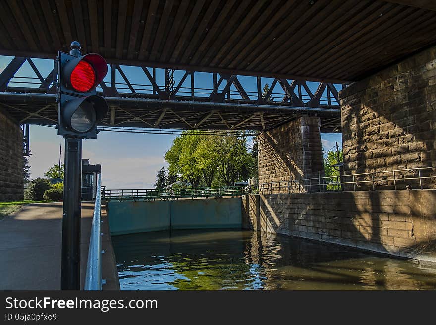 Red light at Sainte-Anne de Bellevue locks in QuÃ©bec Canada. Red light at Sainte-Anne de Bellevue locks in QuÃ©bec Canada