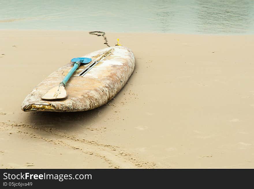 Plastic oar on foam Surfboard