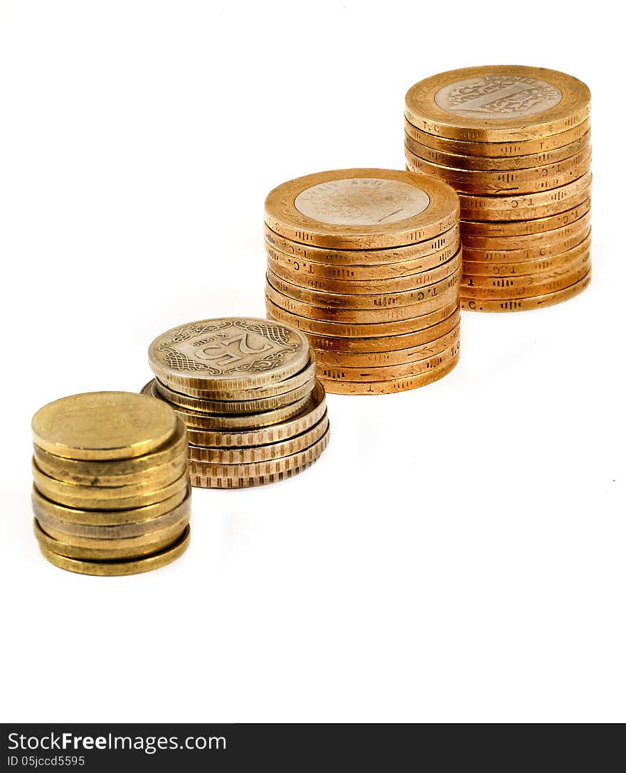 Four stacks of Turkish coins on white background. Four stacks of Turkish coins on white background