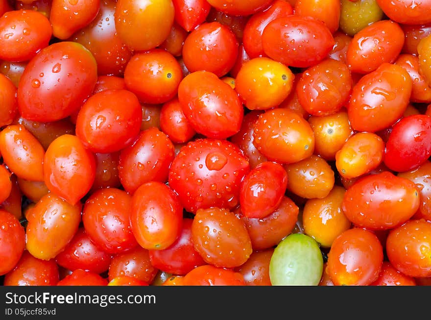 Closeup of fresh tomatos background