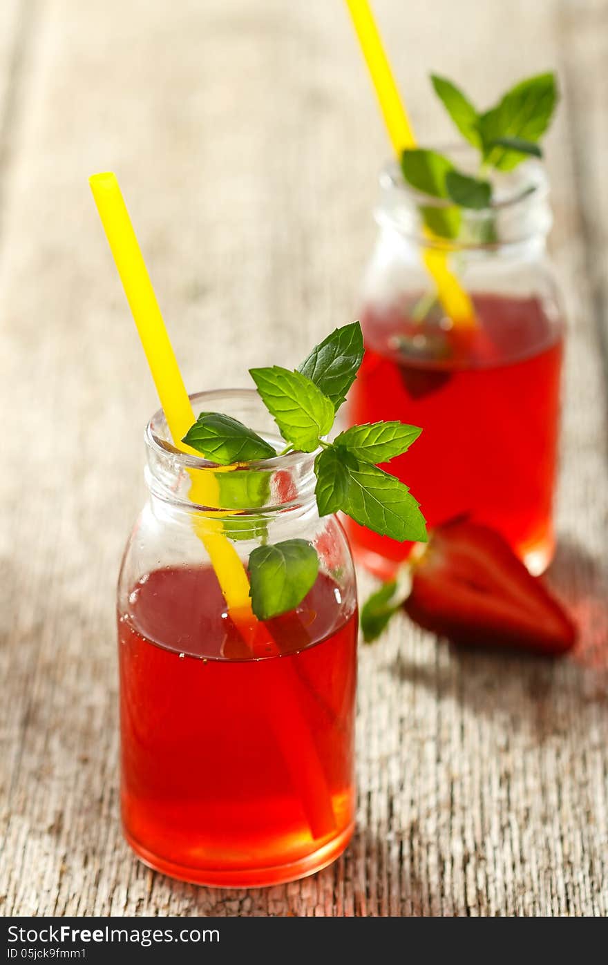 Fresh strawberry drink on wood background. Fresh strawberry drink on wood background