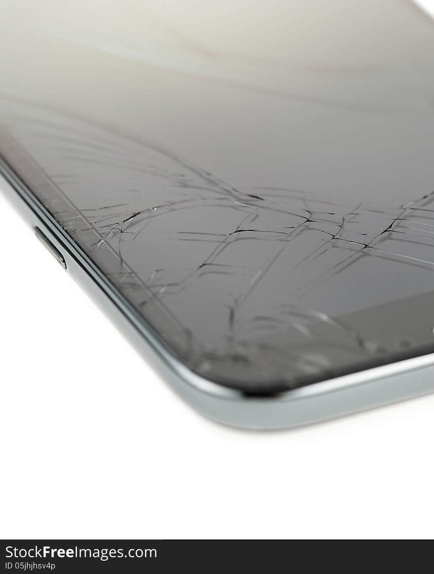 Close up of broken smart phone isolated on white background