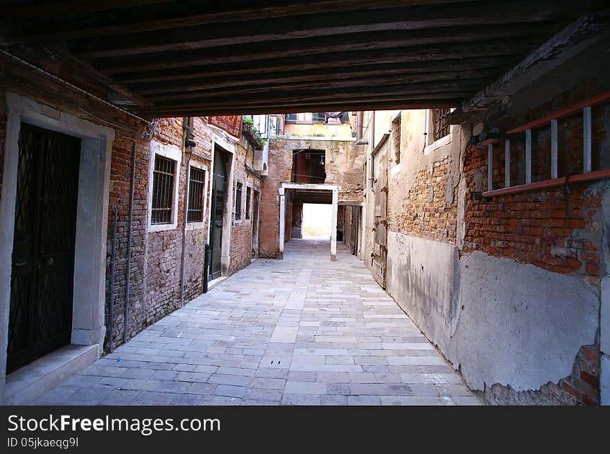 A back alley walk way in Venice on a warm day. A back alley walk way in Venice on a warm day