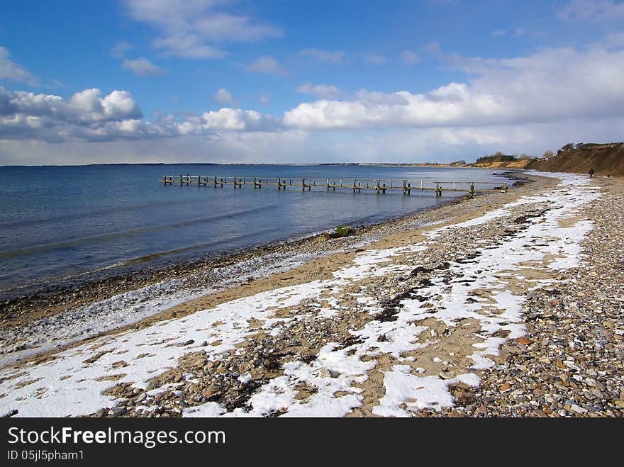 Beautiful winter nature seascape with snow covered seaside