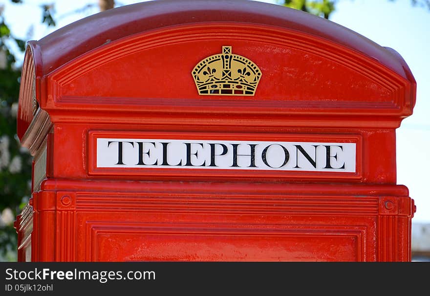 red telephone booth close-up