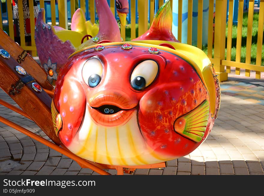 Theme park attraction red and yellow fish