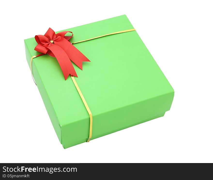 Green gift box with red ribbon bow isolated on white with clipping path