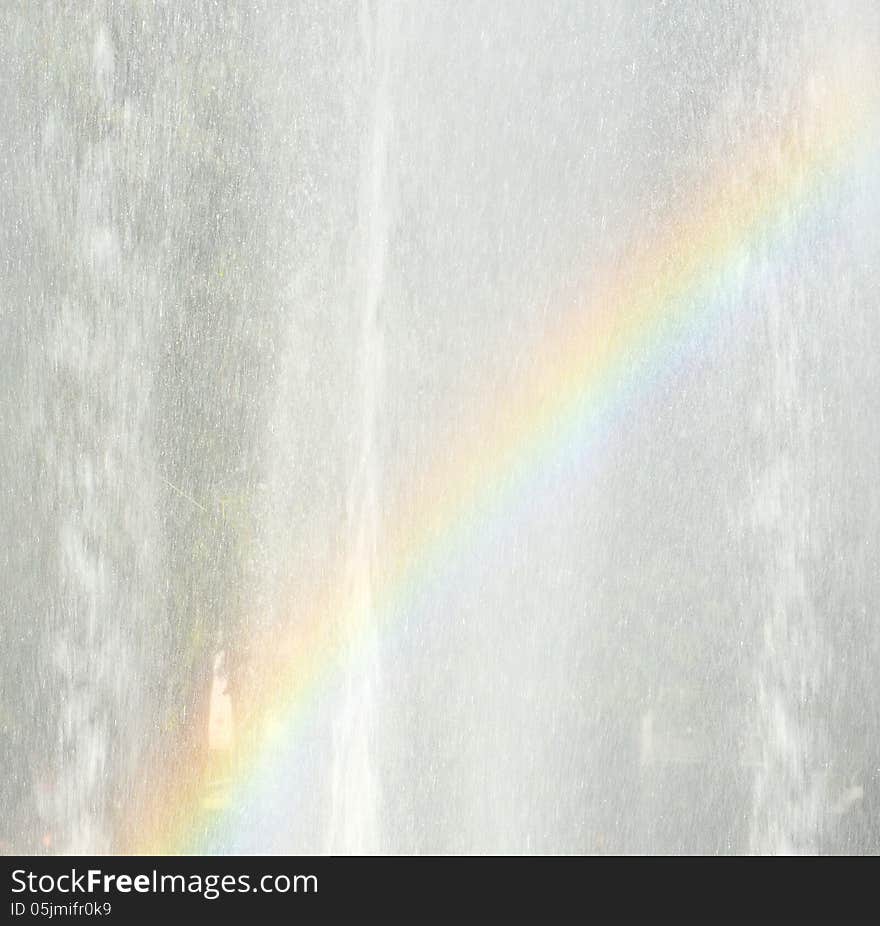 Raindow in a fountain in a park