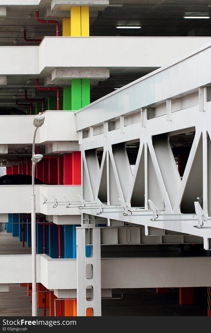 Multi-level car park and a metallic bridge