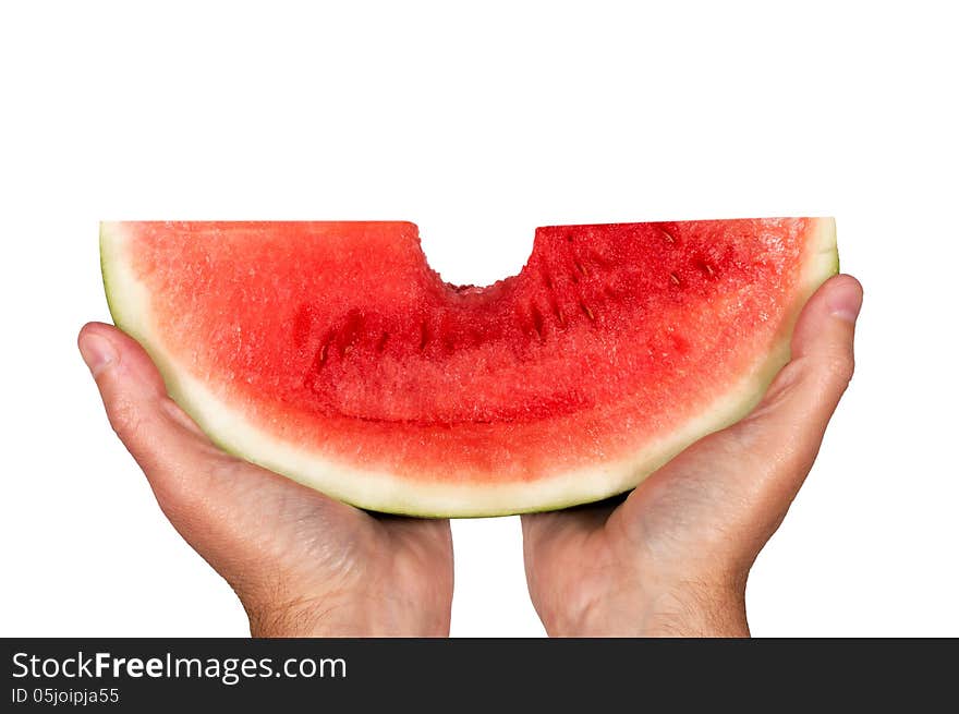 Great shot of hands holding a big slice of watermelon with a big bite out of it. Horizontal shot, isolated on a white background. Great shot of hands holding a big slice of watermelon with a big bite out of it. Horizontal shot, isolated on a white background.