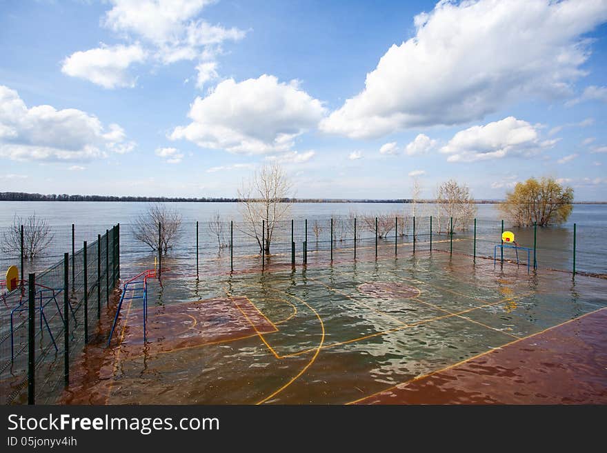 Flooding high waters during spring time in the city. Flooding high waters during spring time in the city