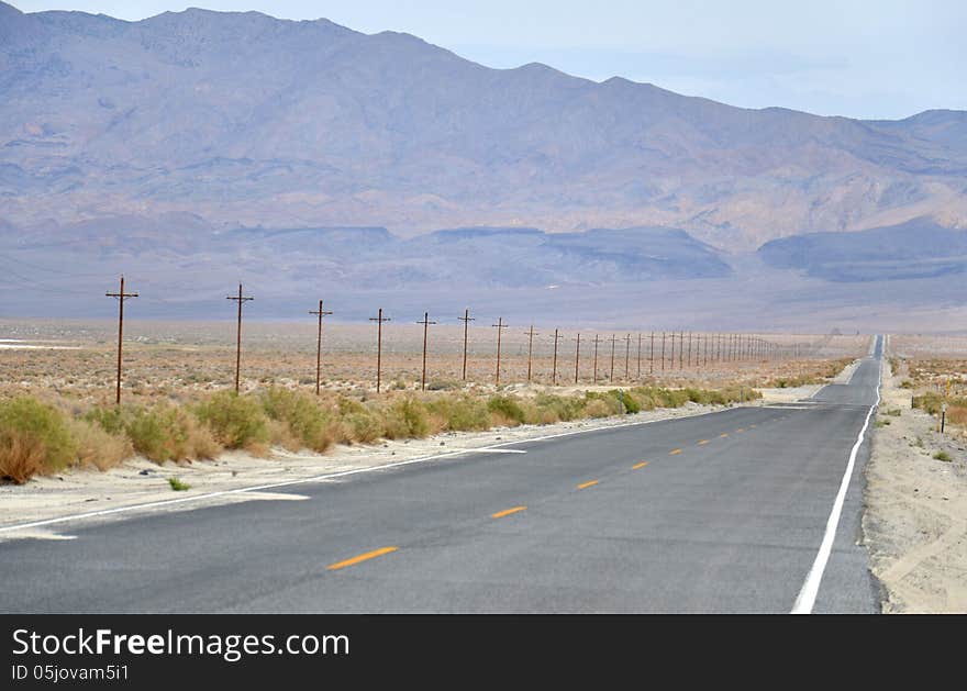 Long road in California, USA. Long road in California, USA.