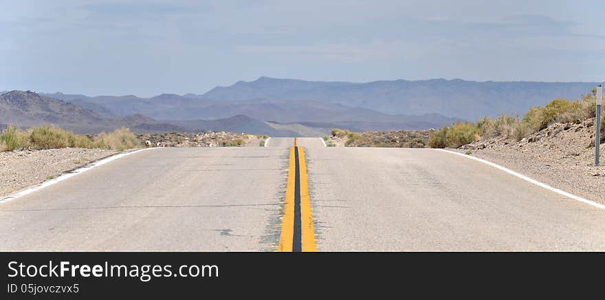 Long road in California, USA. Long road in California, USA.