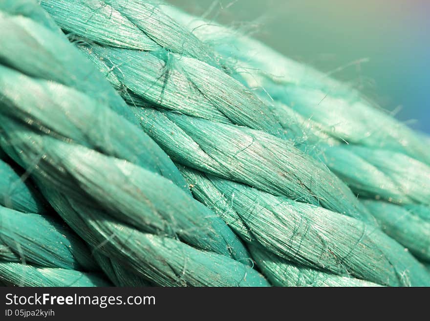 Old green rope, green background. Old green rope, green background.