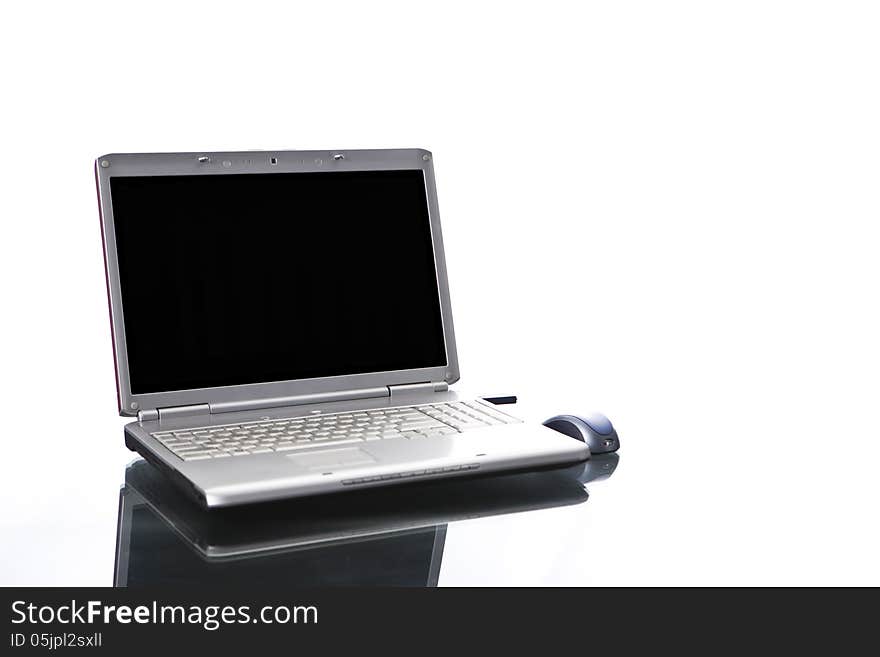 Image of a Computer on a glass desk. Image of a Computer on a glass desk