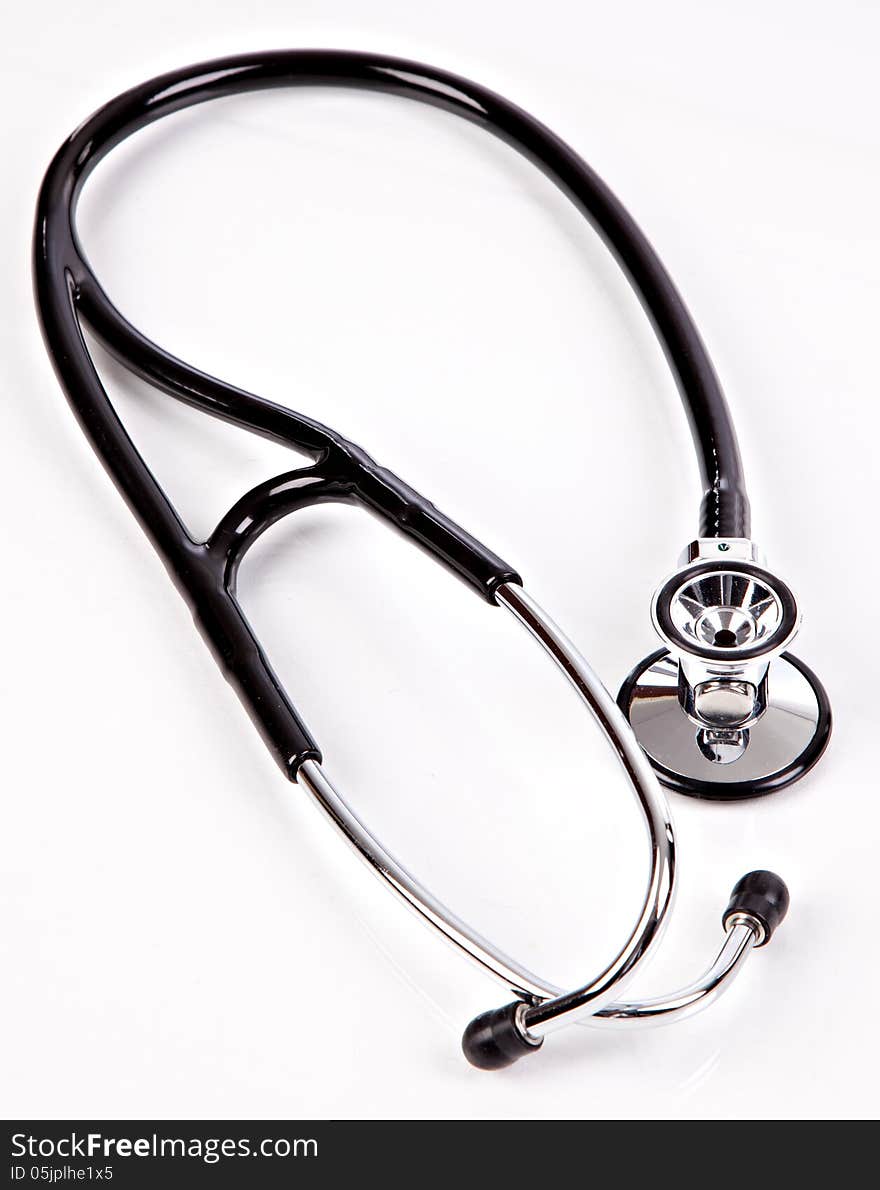 Stethoscope on a sterile white table. Stethoscope on a sterile white table