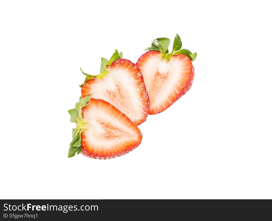 Fresh strawberry slice isolated on white background