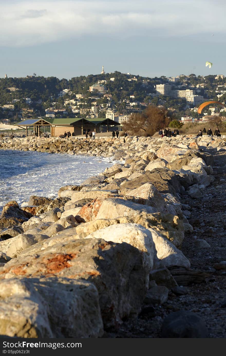 Beach along a rocky coastline. France, mediterranean coast. Beach along a rocky coastline. France, mediterranean coast.