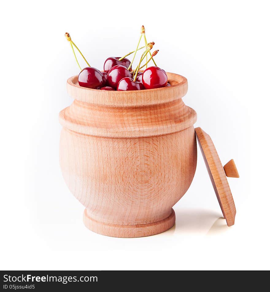 Cherry berries in wooden bowl