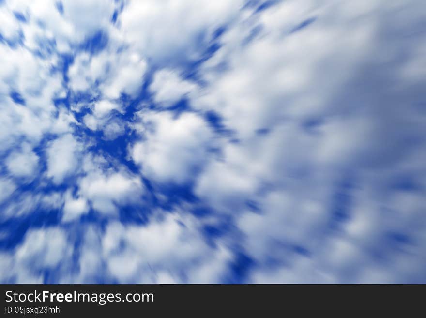 Fluffy blurry clouds on a blue sky. Fluffy blurry clouds on a blue sky