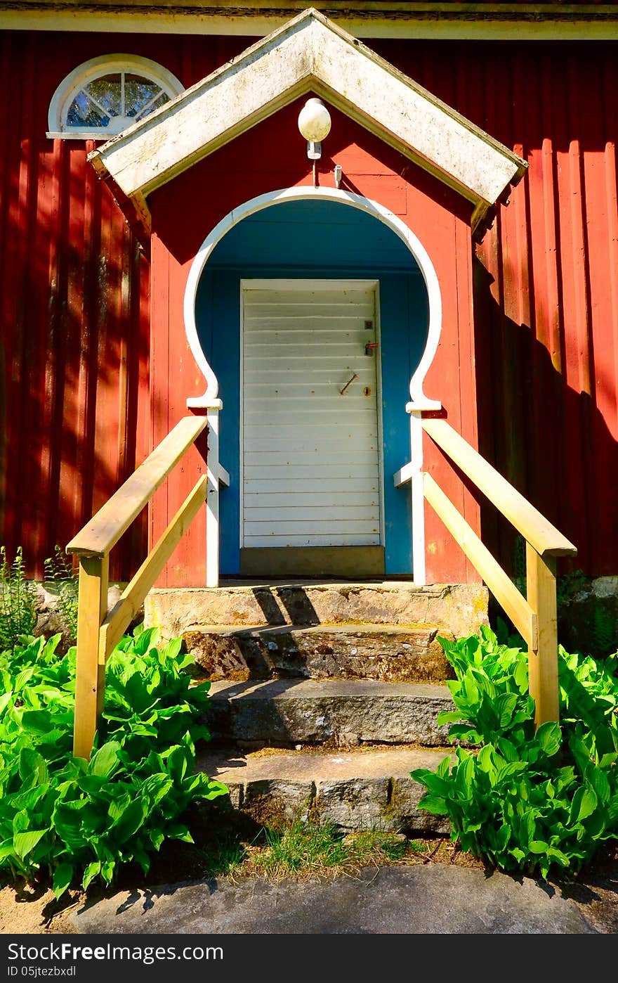 Background old house with door red color. Background old house with door red color