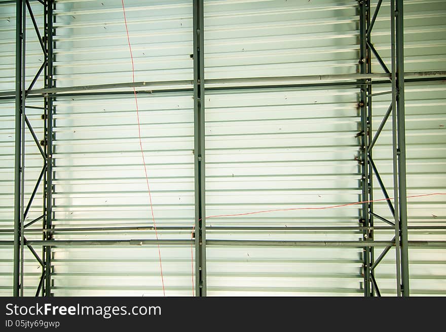 Steel joist supporting metal roof deck