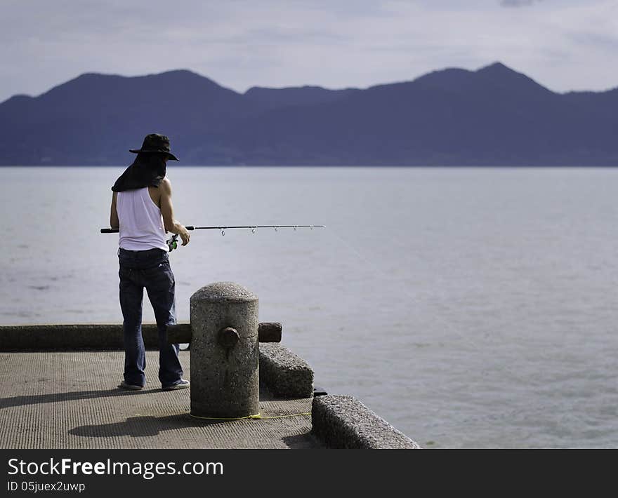 Fisherman fishing trolling in the sea