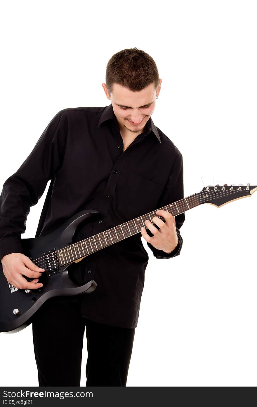 Handsome guy plays the electric guitar