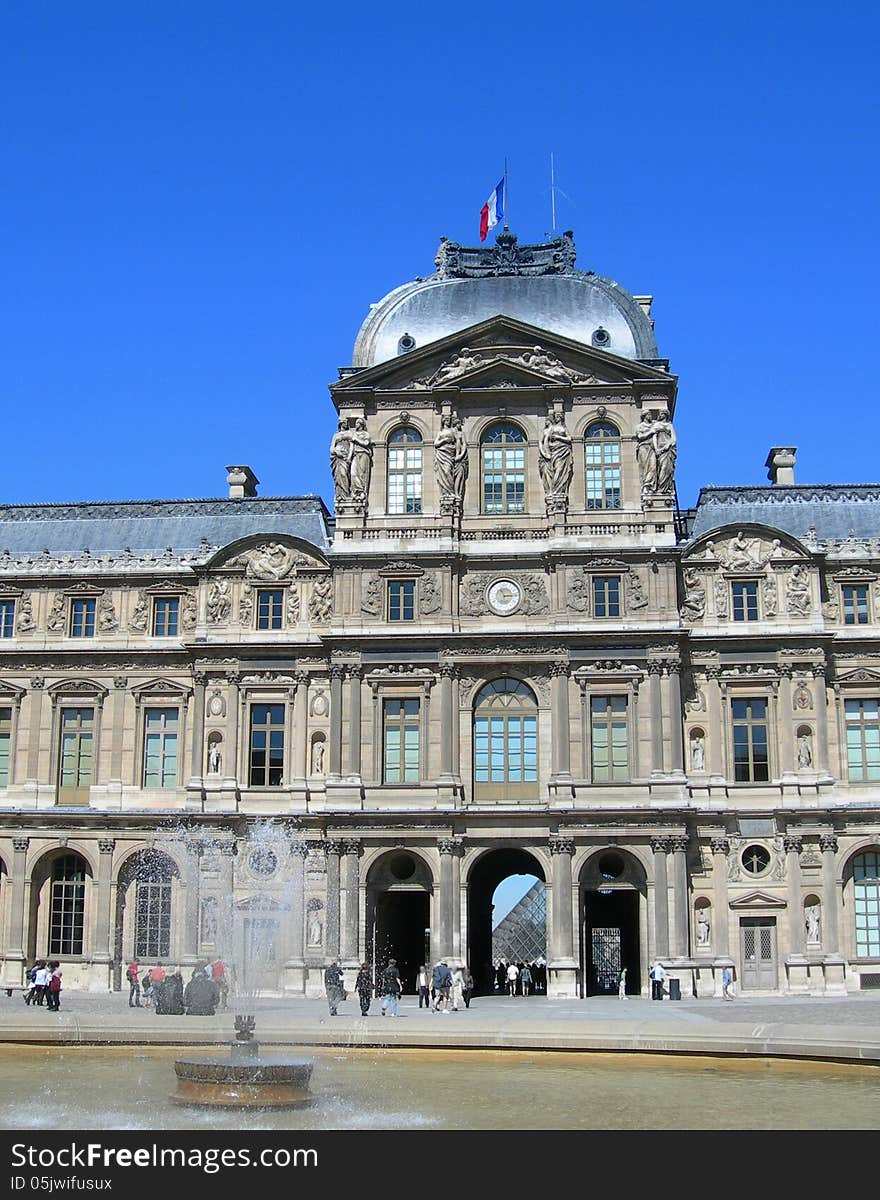 Main entry and interior court of the Louvre museum in Paris, France