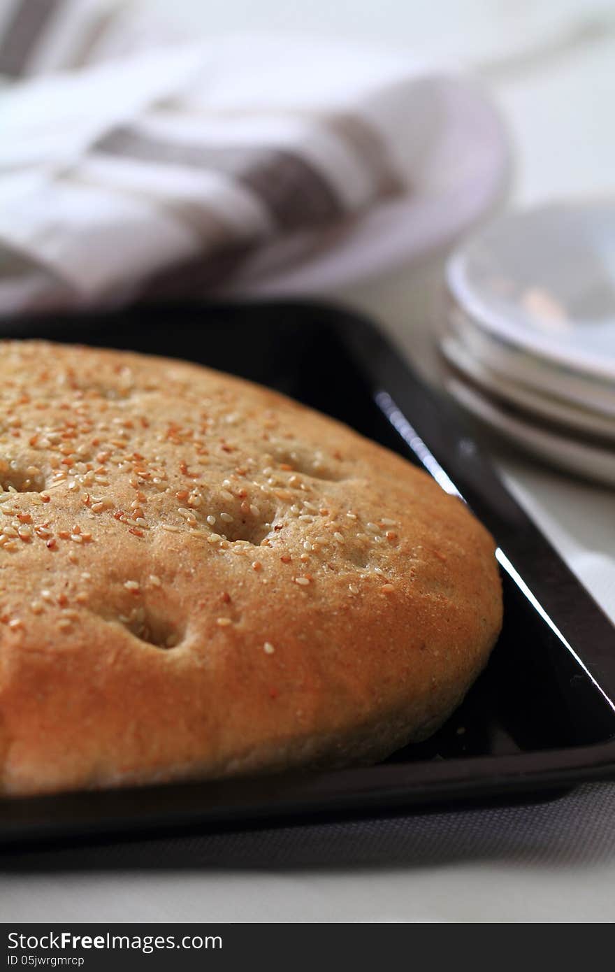 Fresh baked flat bread on the table