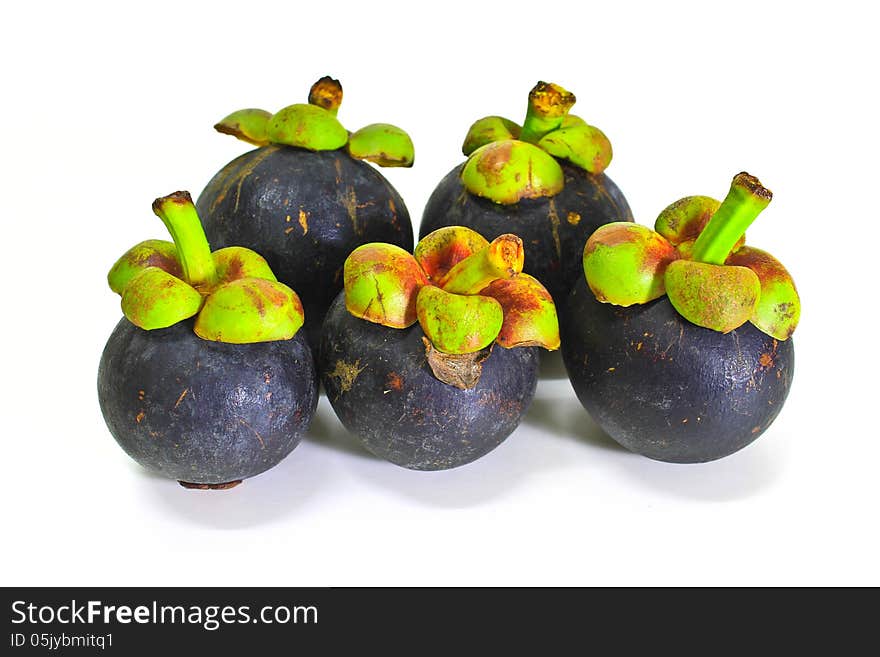 Tropical mangosteen fruit on white background