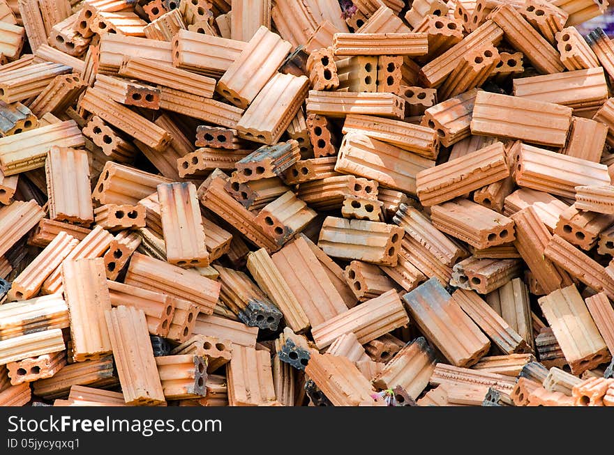 Close up Stack of raw bricks texture