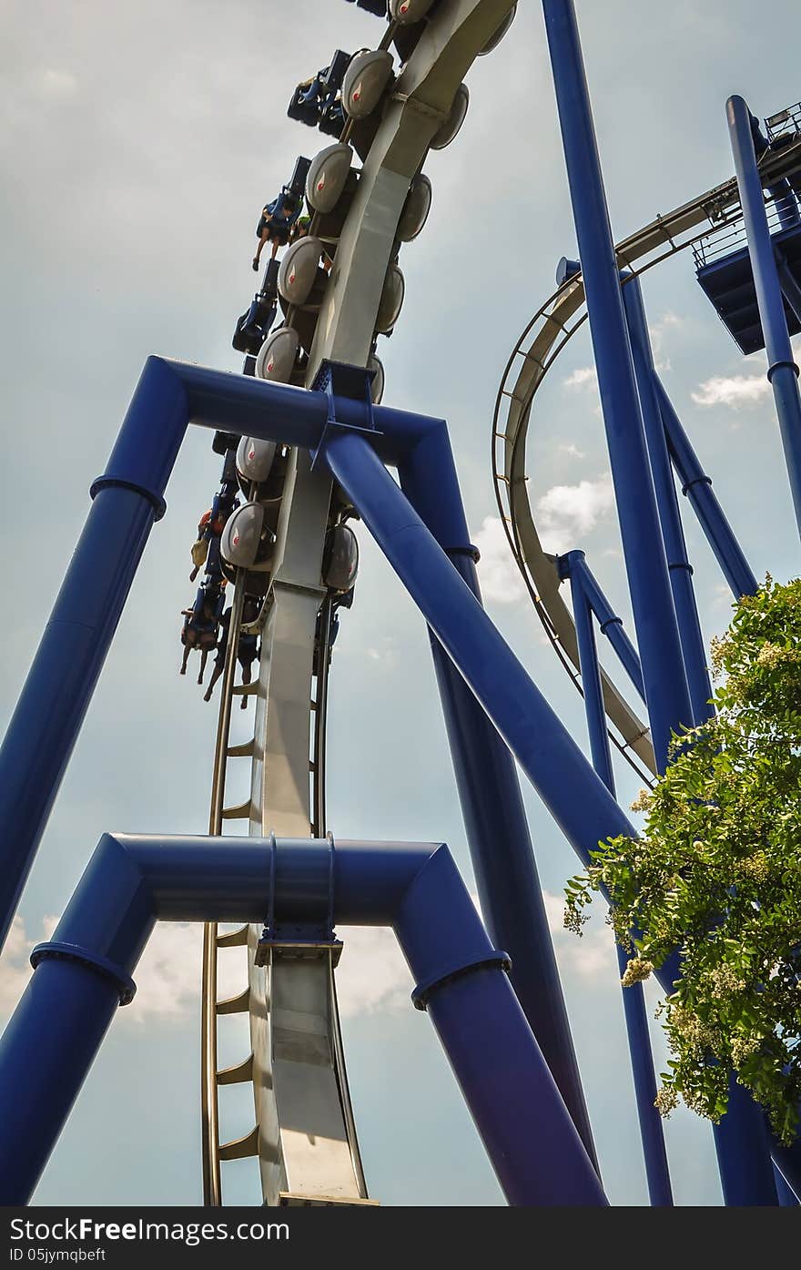 A Rollercoaster At A Theme Park