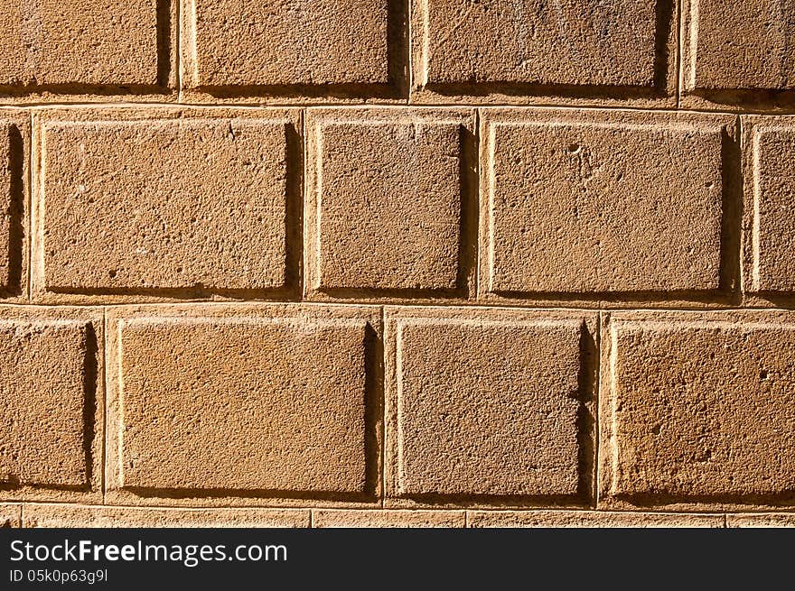 Yellow brick wall pattern background.