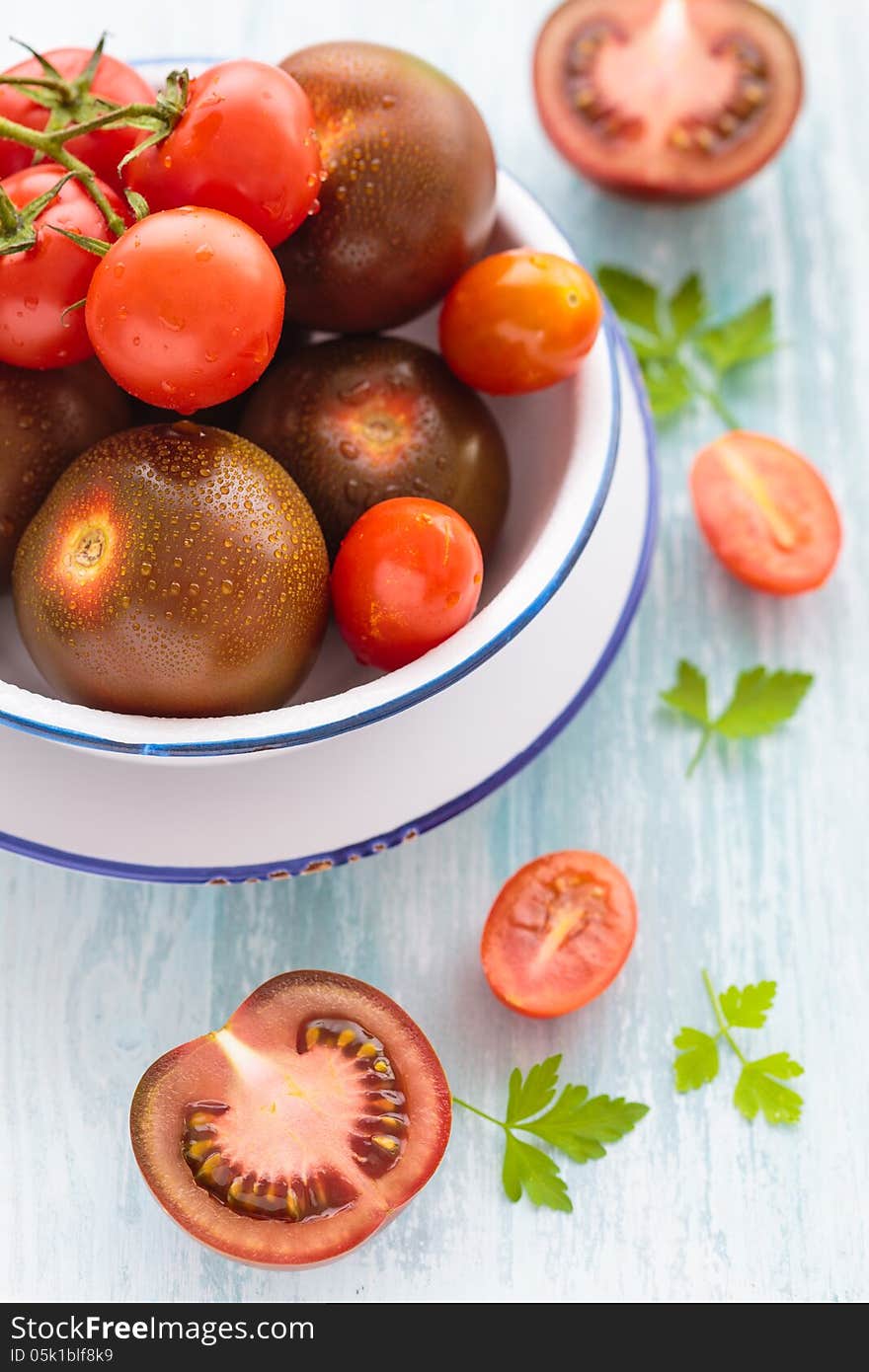 Three varieties of tomato in a dish