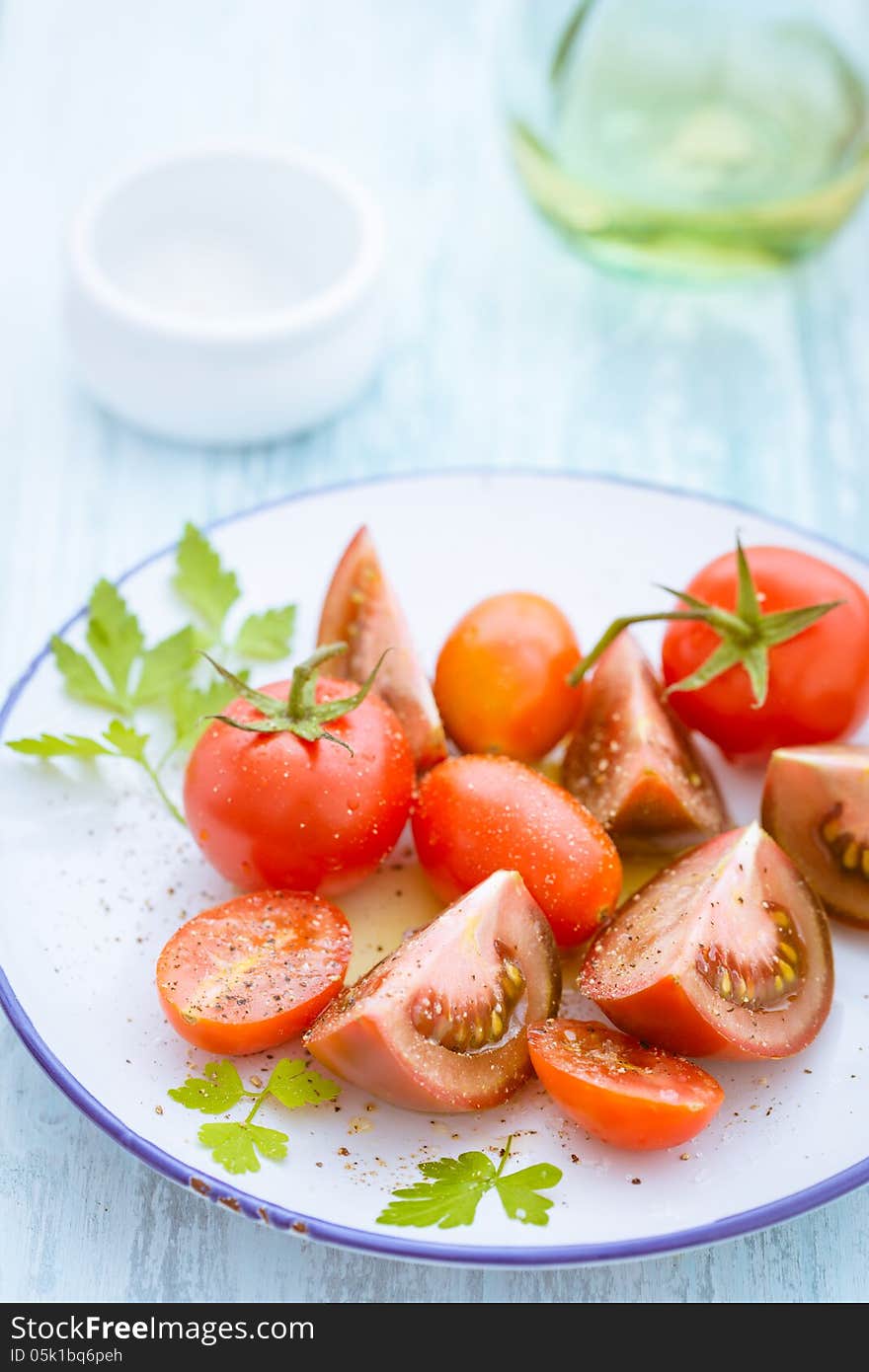 Three varieties of tomato on a plate